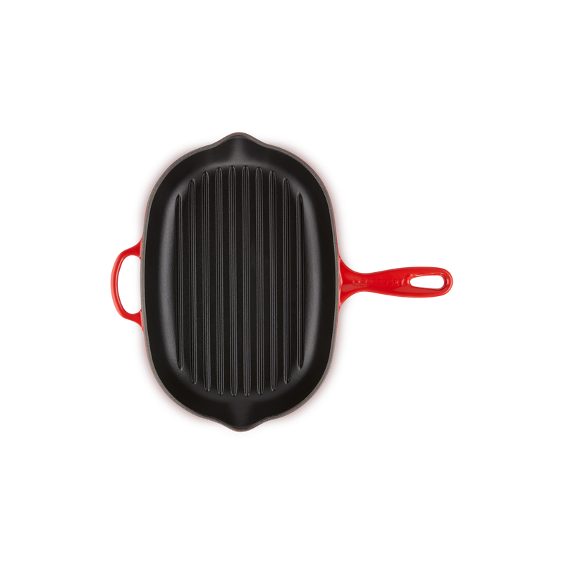 Le Creuset - Poêle en Fonte Skillet Grill Ovale 32 cm Rouge Cerise - Les  Secrets du Chef